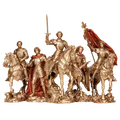 Golden sculpture of five medieval knights, some on horseback, one raising a sword and one a red flag