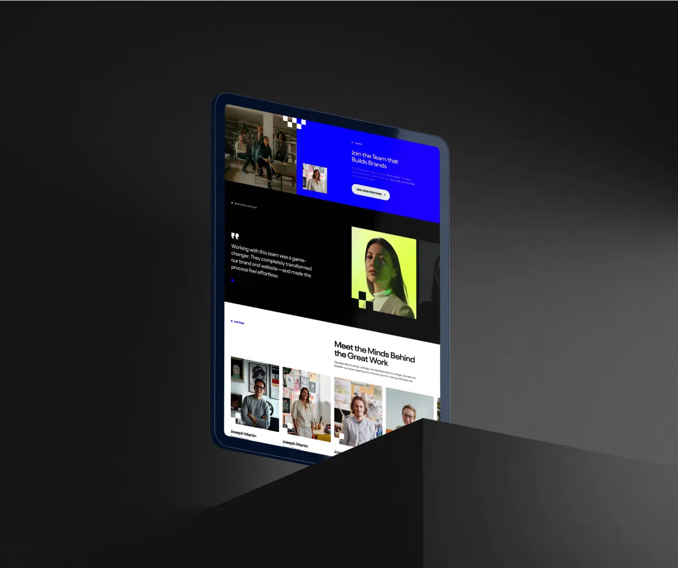 Mythic website on a tablet, standing on a dark plinth