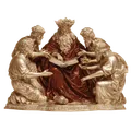 Golden and bronze statue of a kingly figure in red robes reading a large book surrounded by four kneeling men