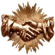 Golden sculpture of two hands shaking with a radiant sunburst design in the background